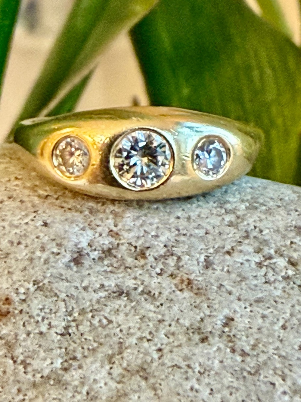 14 karat gold, 1carat three diamond gypsy ring